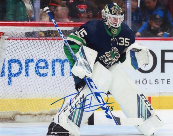 Thatcher Demko Vancouver Canucks Autographed Blue "Johnny Canuck" Alternate Jersey Photograph