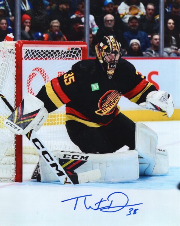 Thatcher Demko Vancouver Canucks Autographed Black Alternate Jersey Photograph
