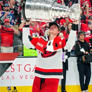 Jackson Blake Carolina Hurricanes Unsigned 2026 Stanley Cup Champions Raising Cup Photograph