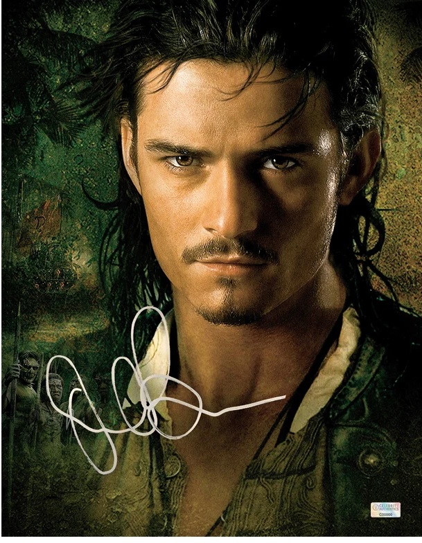 Orlando Bloom Autographed Pirates of the Caribbean 8×10 Portrait Photo