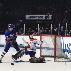 Mike Bossy New York Islanders Autographed Blue Jersey 8x10 Photo