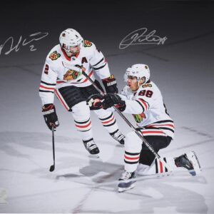 Patrick Kane & Duncan Keith Chicago Blackhawks Autographed 16" x 20" White Jersey Celebration Spotlight Photograph