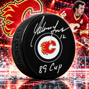 Hakan Loob Calgary Flames Autographed Hockey Puck with 1989 Cup Note