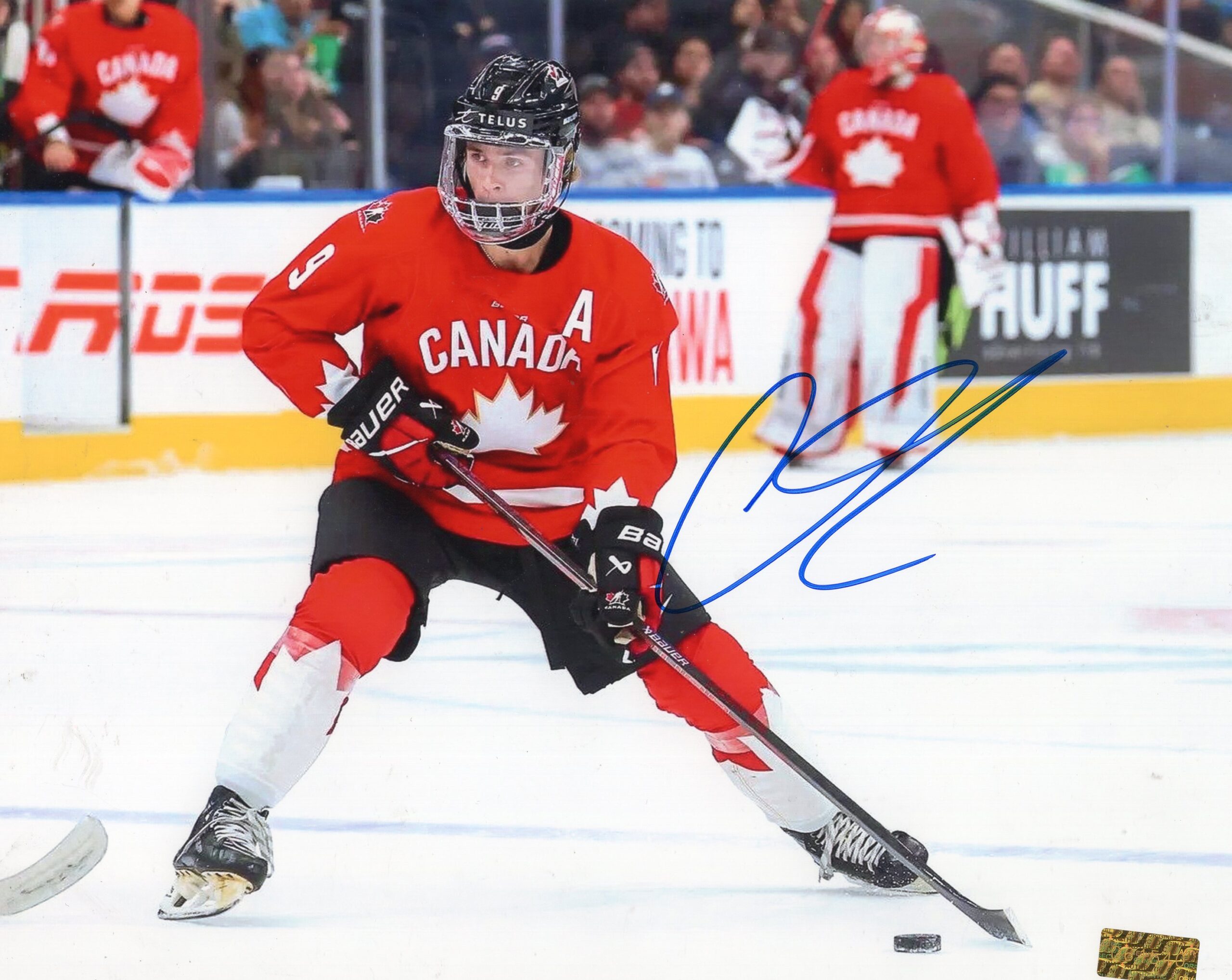 Gavin McKenna Team Canada Autographed Red Jersey 8x10 Photo