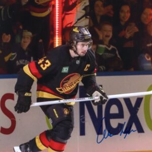 Quinn Hughes Vancouver Canucks Black Skate Jersey Autographed 8x10 Photo