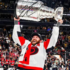 Jaccob Slavin Carolina Hurricanes Autographed 2026 Stanley Cup Champions 8" x 10" Raising Cup Photograph