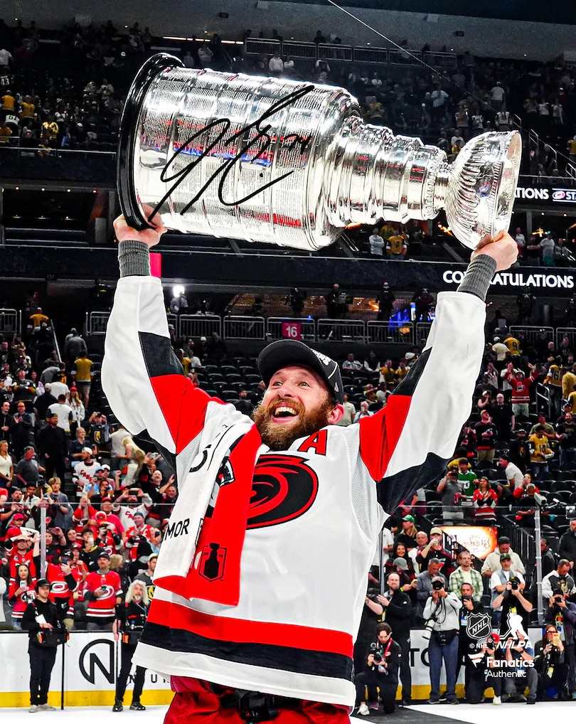Jaccob Slavin Carolina Hurricanes Autographed 2026 Stanley Cup Champions 8" x 10" Raising Cup Photograph