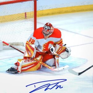 Dustin Wolf Autographed Calgary Flames Between The Pipes 8x10 Photo