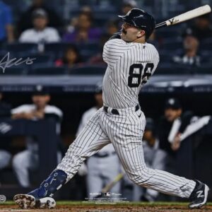 Austin Wells New York Yankees Autographed 16" x 20" White Jersey Swinging Photograph