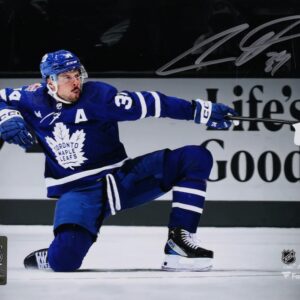 Auston Matthews Toronto Maple Leafs Autographed 16" x 20" One Knee Celebrating Spotlight Photograph