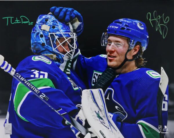 Brock Boeser & Thatcher Demko Vancouver Canucks Dual-Signed 16" x 20" Spotlight Photograph