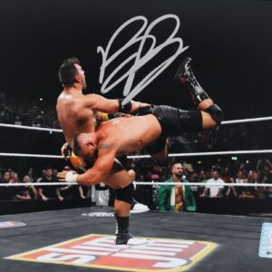 Bron Breakker WWE Autographed 8" x 10" Spear On LA Knight Photograph