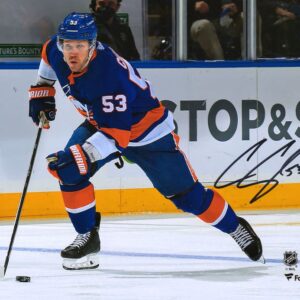 Casey Cizikas New York Islanders Autographed 8" x 10" Royal Jersey Skating with Puck Photograph