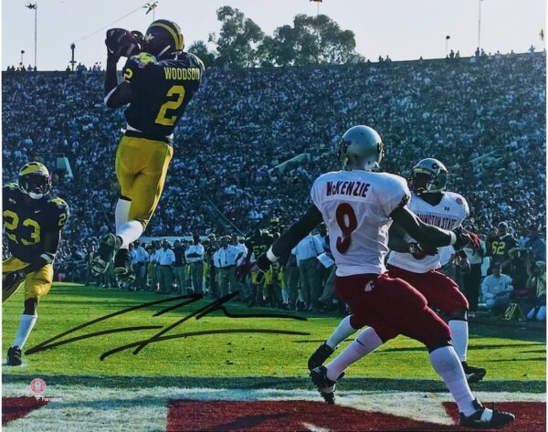 Charles Woodson Michigan Wolverines Autographed 8" x 10" Leaping Interception Photograph
