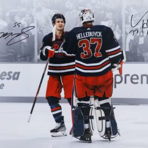 Connor Hellebuyck & Mark Scheifele Winnipeg Jets Autographed 16" x 20" Navy Alternate Jersey Celebration Spotlight Photograph