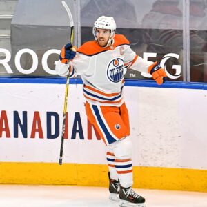 Connor McDavid Edmonton Oilers Unsigned White Reverse Retro Jersey Goal Celebration Photograph
