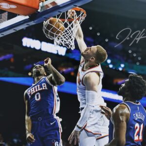 Donte DiVincenzo New York Knicks Autographed 8' x 10" Dunk vs. Philadelphia 76ers Photograph