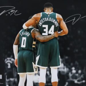 Giannis Antetokounmpo & Damian Lillard Milwaukee Bucks Autographed 16" x 20" Hug Spotlight Photograph
