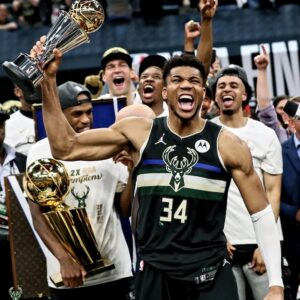 Giannis Antetokounmpo Milwaukee Bucks Unsigned 2021 Bill Russell NBA Finals MVP Celebration Photograph