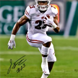 Jonathan Taylor Wisconsin Badgers Autographed 16" x 20" High Knee Run Photograph