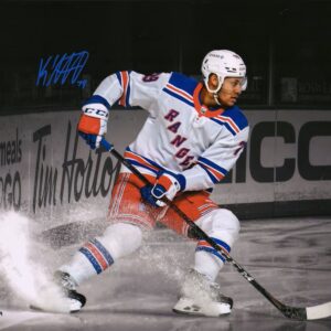 K'Andre Miller New York Rangers Autographed 11" x 14" White Jersey Spotlight Photograph - Limited Edition of 79