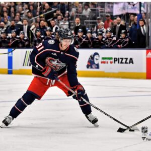 Kent Johnson Columbus Blue Jackets Unsigned Maneuvers the Puck Photograph