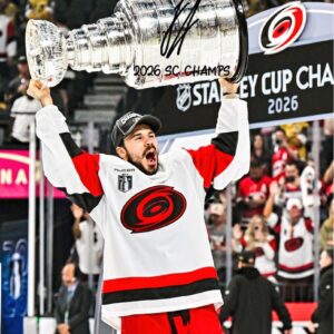Logan Stankoven Carolina Hurricanes Autographed 2026 Stanley Cup Champions 16" x 20" Raising Cup Photograph with "2026 SC Champs" Inscription