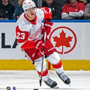 Lucas Raymond Detroit Red Wings Unsigned Skating with Puck 16x20 Photograph