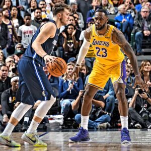 Luka Doncic Dallas Mavericks Unsigned Dribbling vs. LeBron James Photograph
