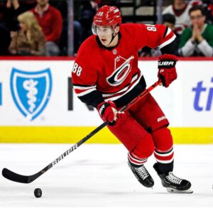 Martin Necas Carolina Hurricanes Unsigned Red Jersey Skating Photograph