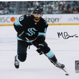 Matty Beniers Seattle Kraken Autographed 8" x 10" Navy Jersey with Puck Photograph