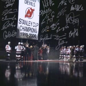 New Jersey Devils Autographed 16" x 20" 2000 Stanley Cup Champions Banner Raising Photograph with 20 Signatures