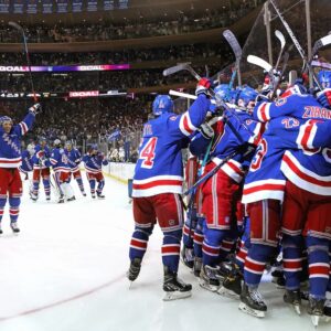 New York Rangers Unsigned 2022 Stanley Cup Playoffs Round 1 Game 7 Overtime Team Celebration Photograph