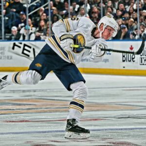 Rasmus Dahlin Buffalo Sabres Unsigned 50th Anniversary Season Alternate Jersey Shooting Photograph