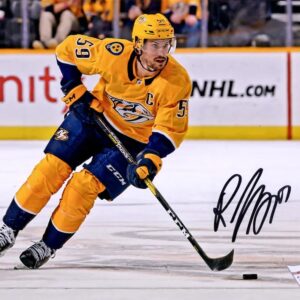 Roman Josi Nashville Predators Autographed 16" x 20" Gold Jersey Skating Photograph
