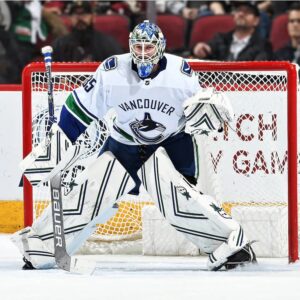 Thatcher Demko Vancouver Canucks Unsigned White Jersey In Net Photograph