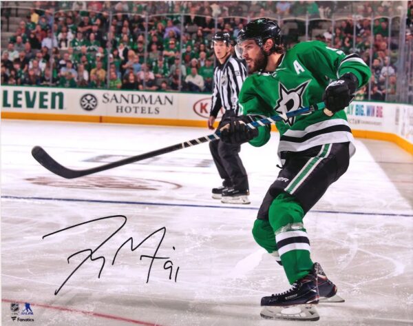 Tyler Seguin Dallas Stars Autographed 16" x 20" Green Jersey Shooting Photograph