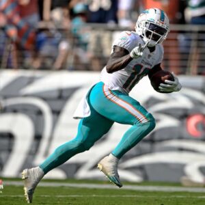 Tyreek Hill Miami Dolphins Unsigned Celebrates a Touchdown Photograph