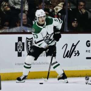 Wyatt Johnston Dallas Stars Autographed 16" x 20" White Jersey with Puck Photograph